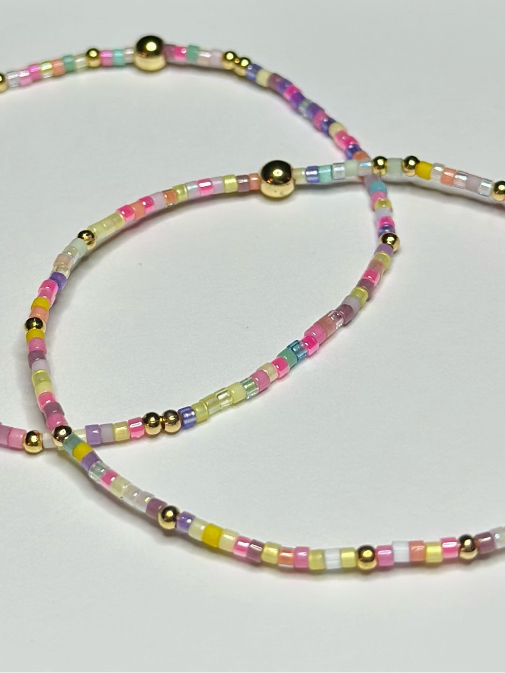 Pastel Multicolor Seed Bead Stretch Bracelet with Gold Accents
